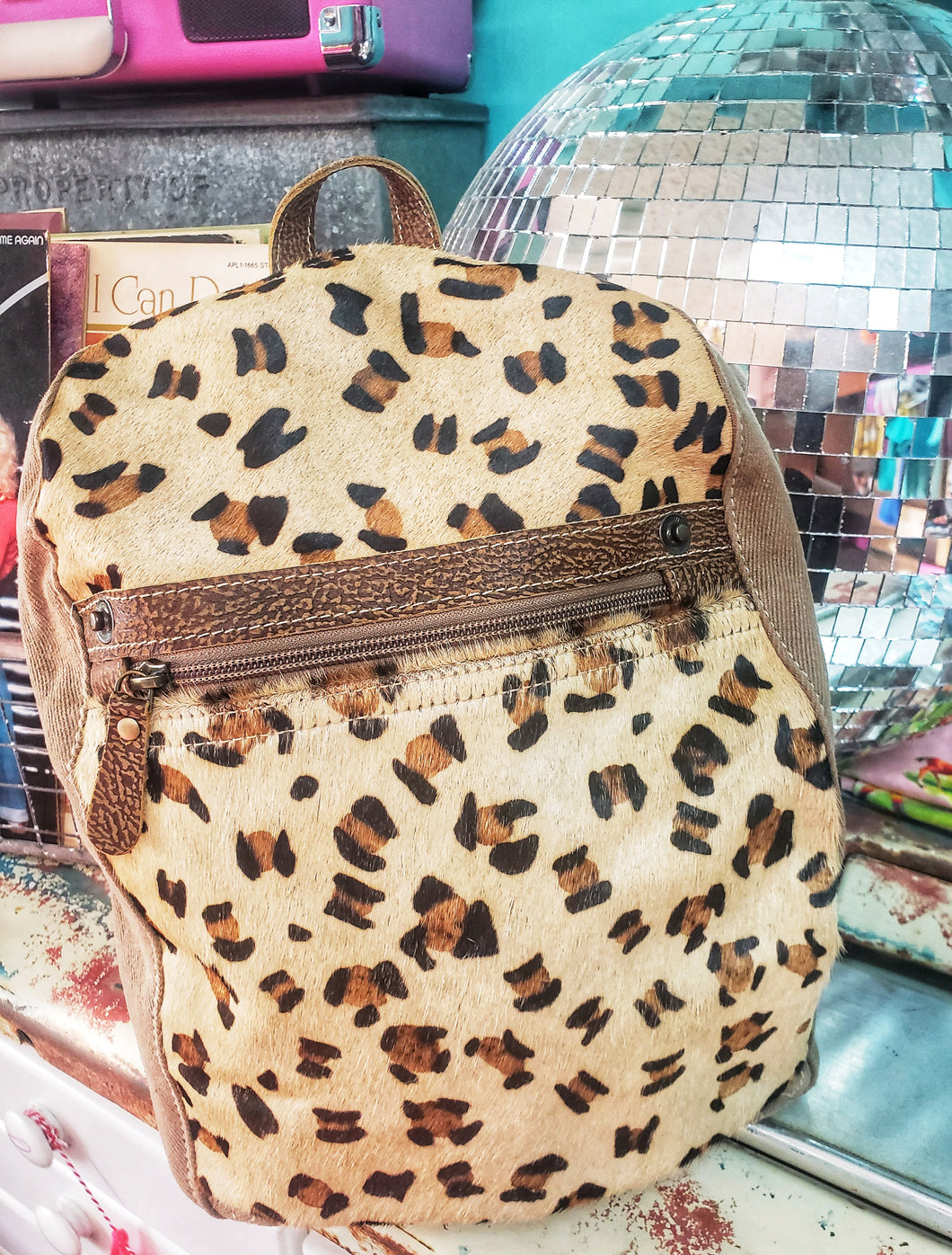 Leopard hair on hide mini back pack/ or mini purse with an add on keychain option