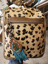 Leopard hair on hide mini back pack/ or mini purse with an add on keychain option