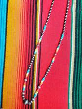 Long faux navajo pearl strand necklace